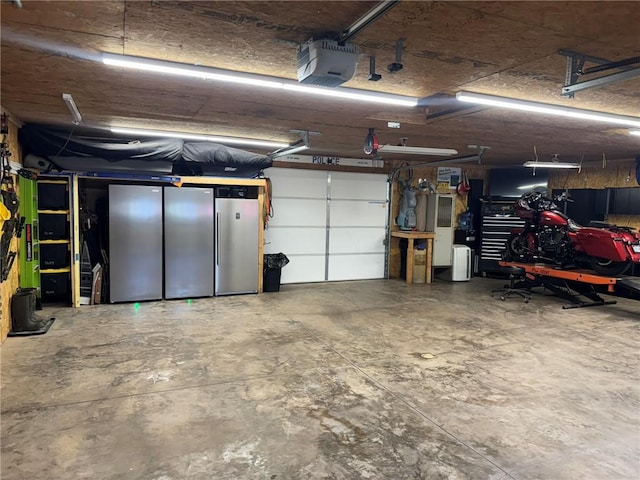 504 Whites Hill Rd, Guilford, NY 13780 - garage featuring a garage door opener