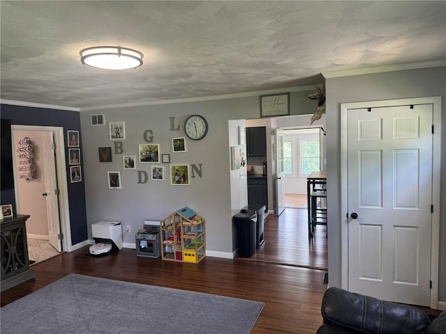504 Whites Hill Rd, Guilford, NY 13780 - living room with dark wood-style floors and ornamental molding