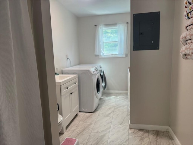 504 Whites Hill Rd, Guilford, NY 13780 - washroom with electric panel, separate washer and dryer, and light marble finish floors