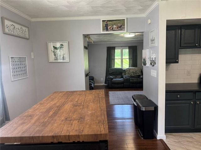 504 Whites Hill Rd, Guilford, NY 13780 - dining space featuring crown molding and wood finished floors
