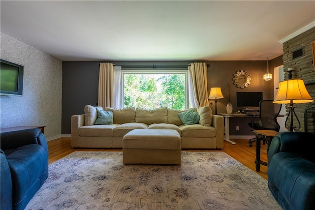 22 Virginia Ln, Chili, NY 14624 - living room featuring wood finished floors and baseboards