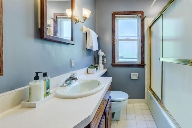 36 Oakmount Dr, Irondequoit, NY 14617 - bathroom featuring vanity, tile patterned floors, and shower / bath combination with glass door