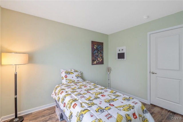 117 Shaker Hts, Camillus, NY 13031 - bedroom featuring wood finished floors and baseboards