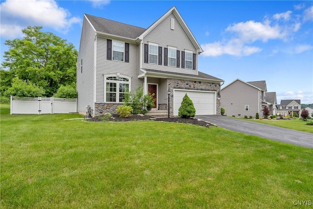 117 Shaker Hts, Camillus, NY 13031 - view of front of home featuring stone siding, asphalt driveway, and an attached garage