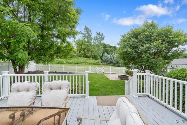 117 Shaker Hts, Camillus, NY 13031 - wooden terrace featuring a fenced backyard and a fire pit
