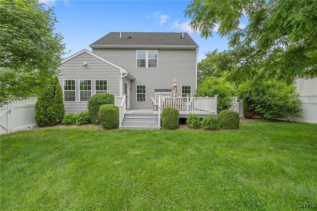117 Shaker Hts, Camillus, NY 13031 - back of house with a wooden deck and a fenced backyard