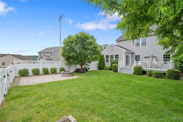 117 Shaker Hts, Camillus, NY 13031 - rear view of house featuring an outdoor fire pit, a fenced backyard, a wooden deck, and a patio