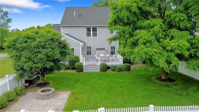 117 Shaker Hts, Camillus, NY 13031 - back of house featuring a fire pit, a deck, a fenced backyard, and a patio area