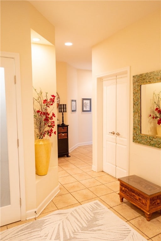 84 Watersong, Penfield, NY 14580 - corridor with light tile patterned floors and recessed lighting