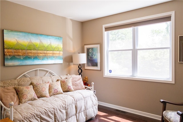 84 Watersong, Penfield, NY 14580 - bedroom with dark wood-type flooring and baseboards