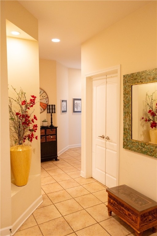 84 Watersong, Penfield, NY 14580 - hall featuring light tile patterned flooring and recessed lighting