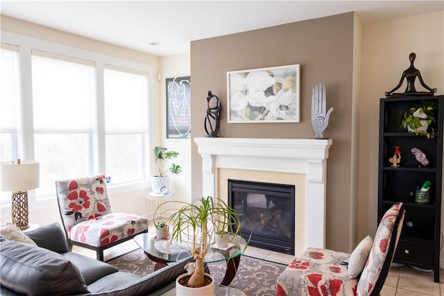 84 Watersong, Penfield, NY 14580 - living area with a glass covered fireplace and tile patterned flooring