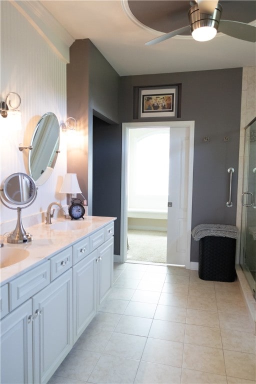 84 Watersong, Penfield, NY 14580 - full bathroom featuring a stall shower, double vanity, a ceiling fan, and tile patterned flooring