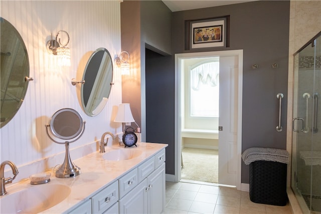 84 Watersong, Penfield, NY 14580 - bathroom with double vanity, a stall shower, and tile patterned flooring