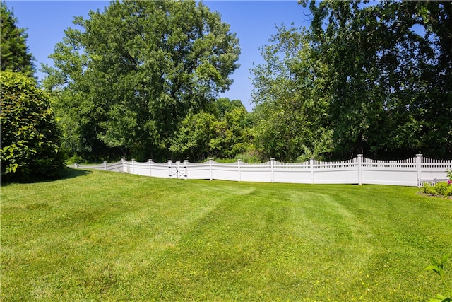 84 Watersong, Penfield, NY 14580 - view of yard featuring view of wooded area
