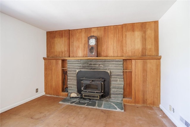 500 Pine Grove Ave, Irondequoit, NY 14617 - detailed view of a wood stove and baseboards
