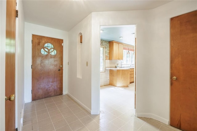 500 Pine Grove Ave, Irondequoit, NY 14617 - entryway featuring baseboards