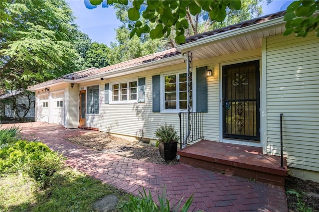 500 Pine Grove Ave, Irondequoit, NY 14617 - entrance to property with a garage