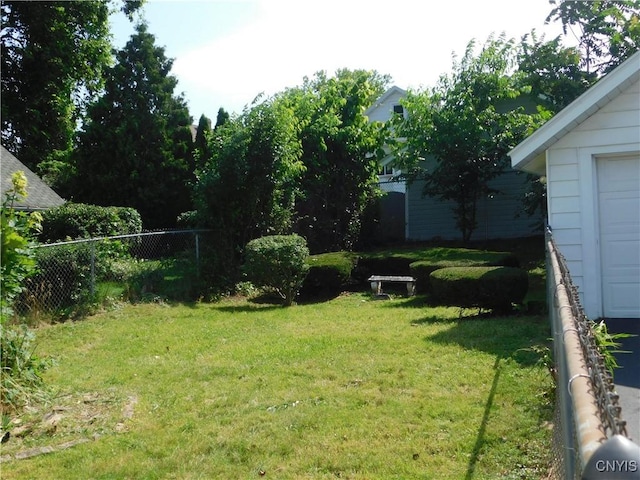 205 Shotwell Park Unit 100, Syracuse, NY 13206 - view of yard with a garage
