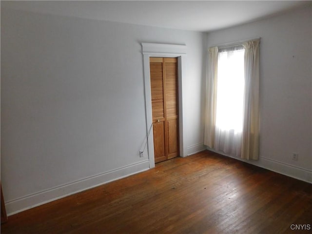 205 Shotwell Park Unit 100, Syracuse, NY 13206 - spare room featuring light wood finished floors and baseboards