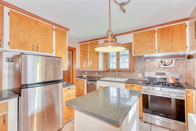 103 Culver Pkwy, Irondequoit, NY 14609 - kitchen with appliances with stainless steel finishes, under cabinet range hood, tasteful backsplash, light tile patterned flooring, and a kitchen island