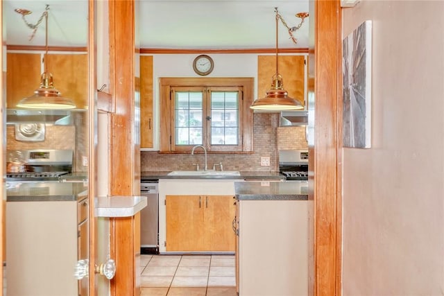 103 Culver Pkwy, Irondequoit, NY 14609 - kitchen with appliances with stainless steel finishes, decorative backsplash, light tile patterned floors, and decorative light fixtures