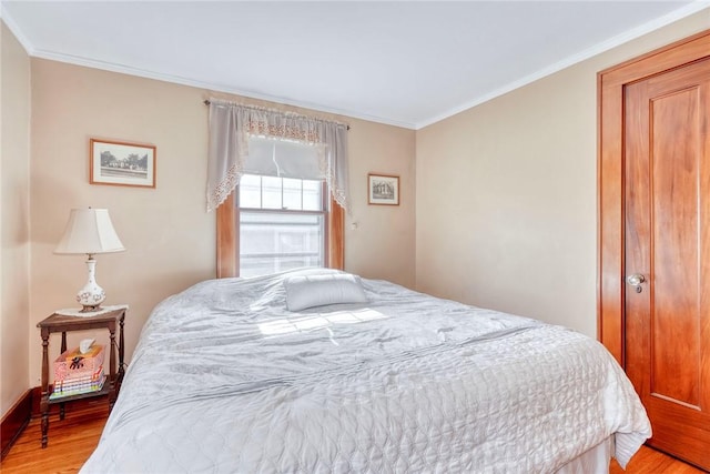 103 Culver Pkwy, Irondequoit, NY 14609 - bedroom with light wood-style flooring and ornamental molding