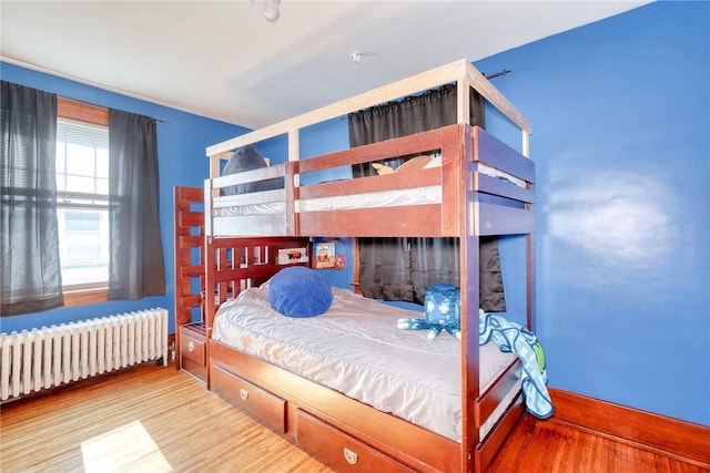 103 Culver Pkwy, Irondequoit, NY 14609 - bedroom with radiator and wood finished floors