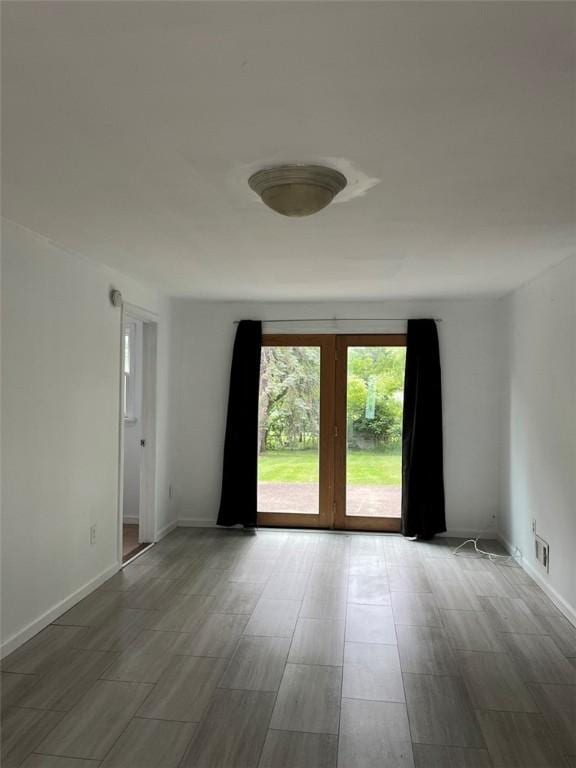 120 Valley St, Rochester, NY 14612 - unfurnished room with wood finished floors and baseboards