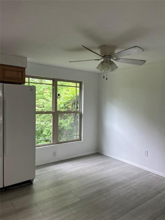 120 Valley St, Rochester, NY 14612 - unfurnished room featuring a ceiling fan and baseboards