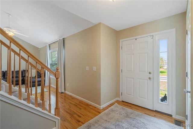 5269 Medasano Cir, Clay, NY 13041 - entryway with wood finished floors, stairway, and ceiling fan