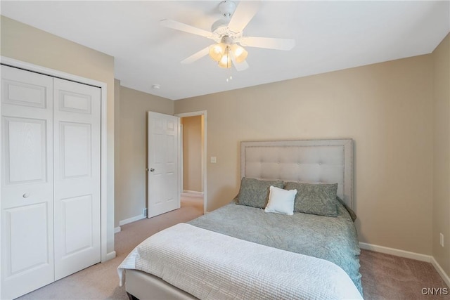 5269 Medasano Cir, Clay, NY 13041 - bedroom featuring light carpet, a closet, and a ceiling fan