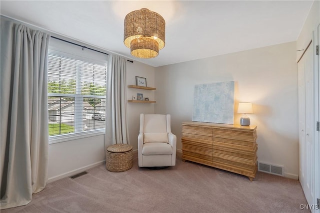 5269 Medasano Cir, Clay, NY 13041 - living area featuring carpet floors and a chandelier