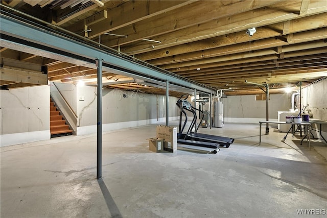 53 Christine Dr, Amherst, NY 14228 - unfinished basement with gas water heater, stairs, and washer / clothes dryer