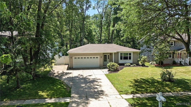 53 Christine Dr, Amherst, NY 14228 - view of front of home featuring an attached garage, driveway, a front yard, and a shingled roof