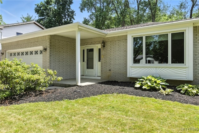 53 Christine Dr, Amherst, NY 14228 - view of front of property with brick siding, a garage, and a front yard