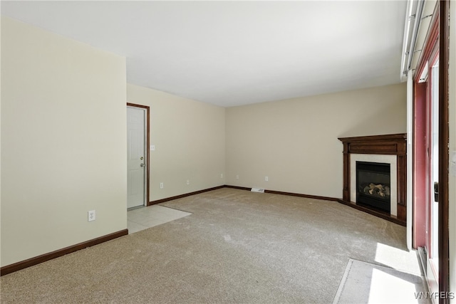 53 Christine Dr, Amherst, NY 14228 - unfurnished living room with light colored carpet and a glass covered fireplace