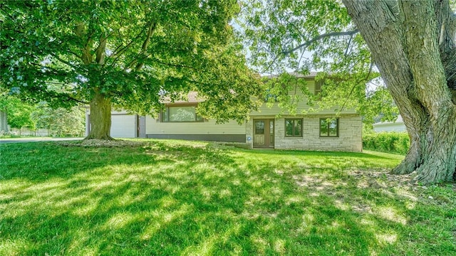 238 Fisher Rd, Chili, NY 14624 - view of front of home with a front lawn and a garage
