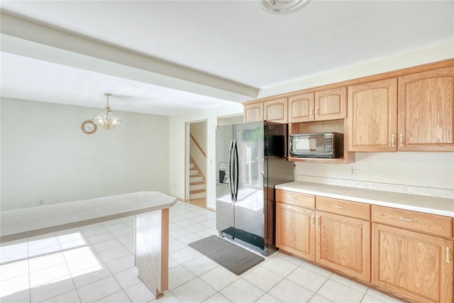 238 Fisher Rd, Chili, NY 14624 - kitchen featuring stainless steel fridge with ice dispenser, black microwave, light countertops, light brown cabinets, and decorative light fixtures