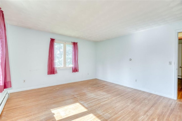 238 Fisher Rd, Chili, NY 14624 - unfurnished room with light wood-style flooring and baseboard heating