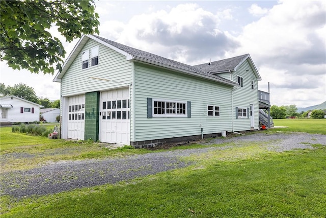 514 Maple St, Big Flats, NY 14814 - view of side of property with a lawn and roof with shingles