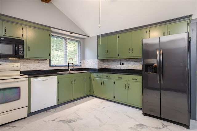 514 Maple St, Big Flats, NY 14814 - kitchen featuring white appliances, light marble finish flooring, vaulted ceiling, tasteful backsplash, and dark countertops