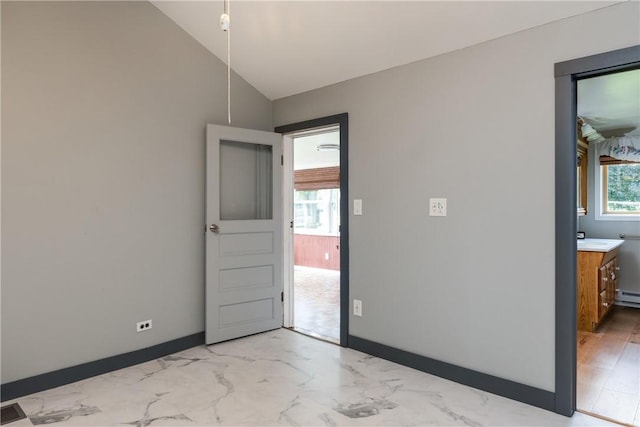 514 Maple St, Big Flats, NY 14814 - unfurnished dining area with lofted ceiling, light marble finish flooring, and a baseboard heating unit