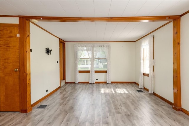 514 Maple St, Big Flats, NY 14814 - spare room featuring crown molding and light wood-style flooring