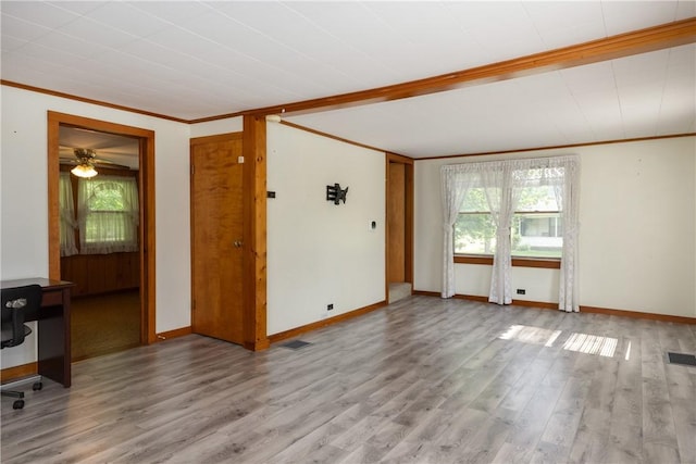 514 Maple St, Big Flats, NY 14814 - spare room featuring healthy amount of natural light, crown molding, wood finished floors, and ceiling fan