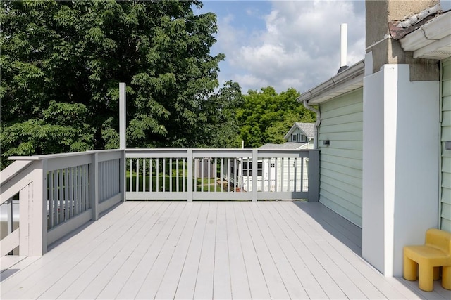 514 Maple St, Big Flats, NY 14814 - wooden deck featuring view of scattered trees