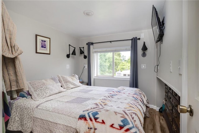 514 Maple St, Big Flats, NY 14814 - bedroom featuring wood finished floors and baseboards