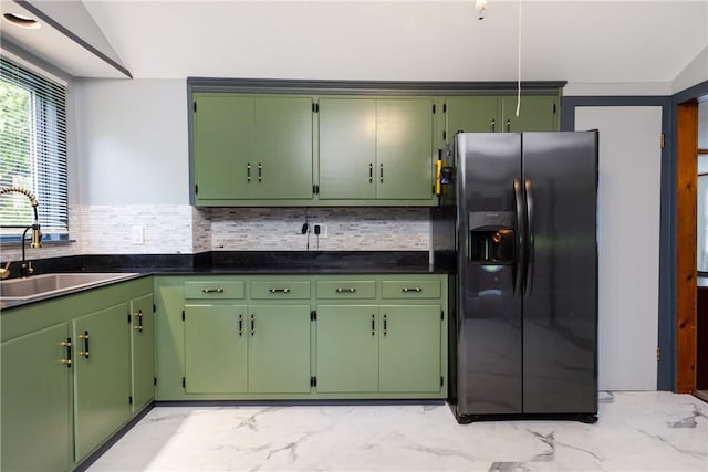 514 Maple St, Big Flats, NY 14814 - kitchen featuring refrigerator with ice dispenser, light marble finish flooring, backsplash, and dark countertops