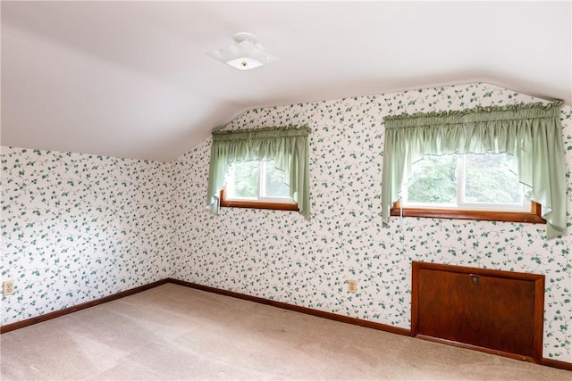 514 Maple St, Big Flats, NY 14814 - bonus room featuring lofted ceiling, carpet, and wallpapered walls