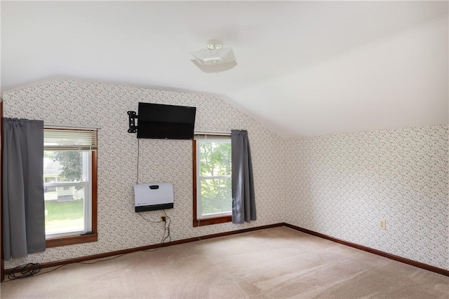 514 Maple St, Big Flats, NY 14814 - additional living space featuring vaulted ceiling, healthy amount of natural light, heating unit, and carpet floors